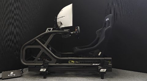 A SIMRIG SR3 motion system under a tubular sim racing rig, seen from the side